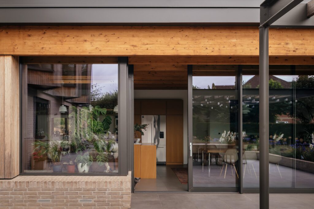 schuco aluminium sliding doors dark grey exterior trinity windows jersey 2500