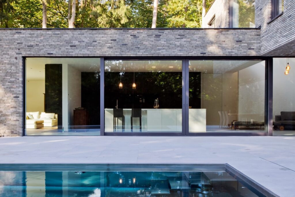 technal confort160 slimline sliding doors modern home with pool trinity windows jersey 2500