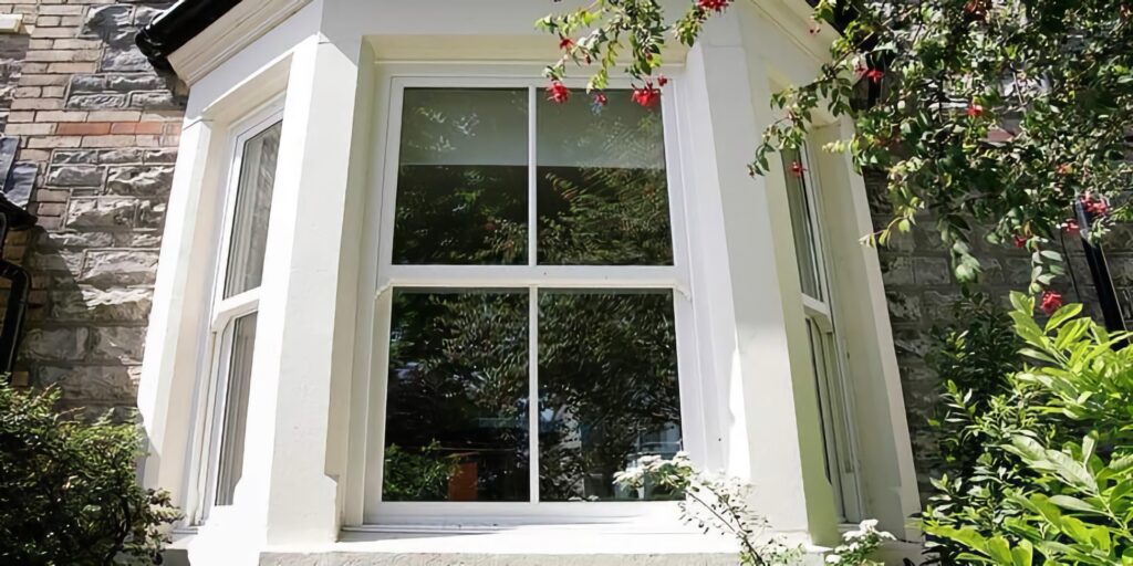 white upvc sash bay window traditional home traditional historic style trinity windows jersey 2500