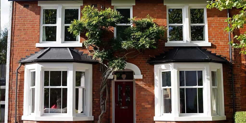 white upvc sash windows bay home traditional historic style trinity windows jersey 2500